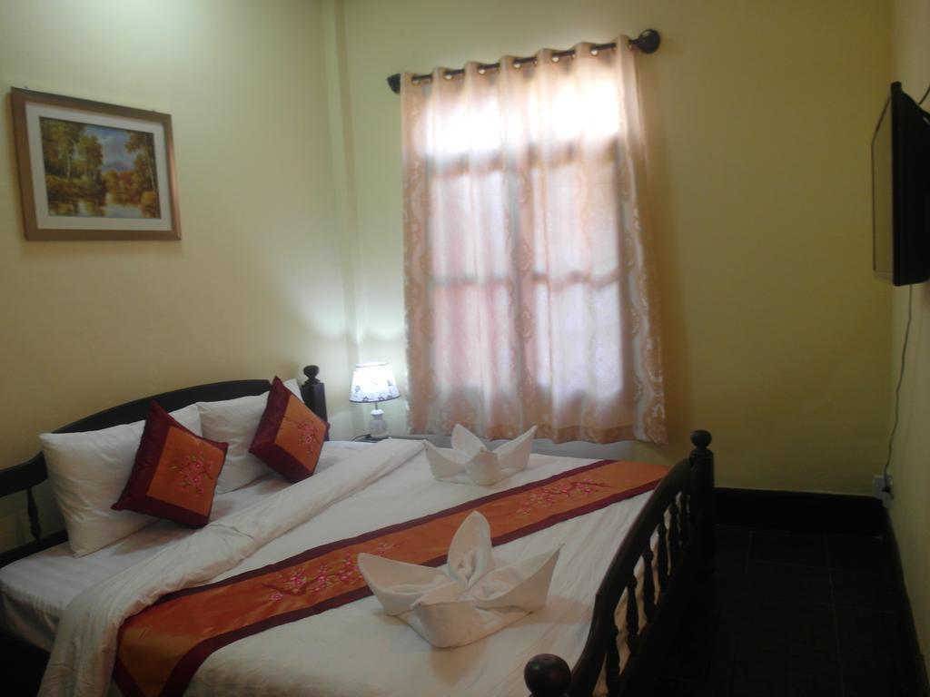 לואנג פרבאנג Kinnaly Place House חדר תמונה